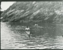Image of Two Eskimos [Inuit] in kayaks